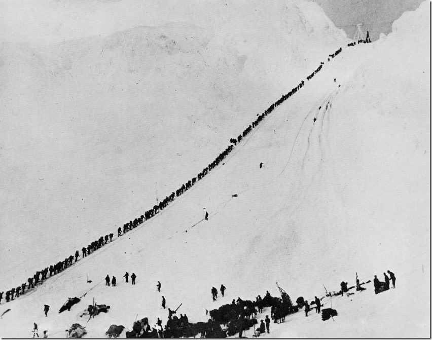 1200px-Miners_climb_Chilkoot