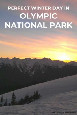 sun setting behind mountains with snow in the foreground. Text says perfect winter day in Olympic National Park