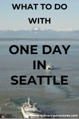 Two ferries on the water with snow capped mountains in the distance. Text reads: what to do with one day in Seattle