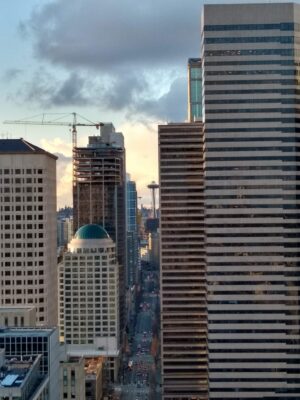 Tall buildings with the Space Needle between them