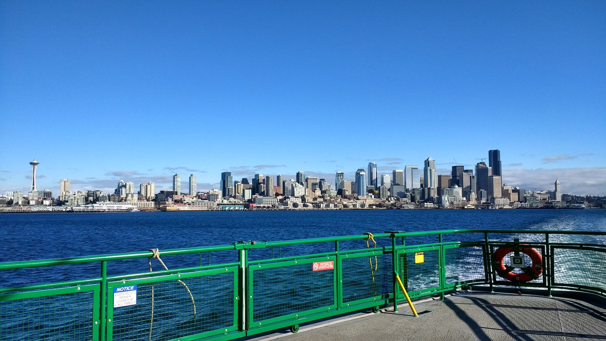 The Seattle city skyline from the ferry. The deck of the ferry is in the foreground