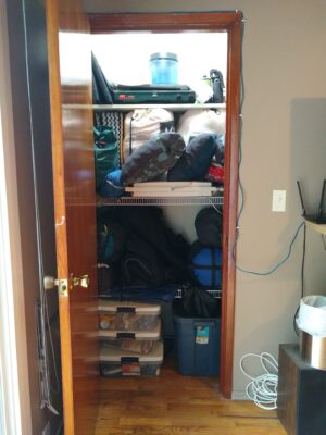 Part of camping checklist is keeping the gear organized. This is a gear closet with places for all the camping gear