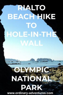 A large hole in a rock on the beach in Olympic National Park. Tidepools are under the arch and distant islands can be seen in the ocean in the distance. Text reads: Rialto beach hike to Hole-in-the-wall Olympic National Park