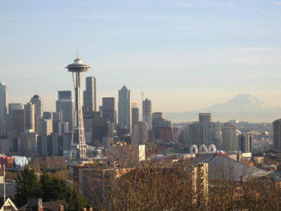 View of downtown Seattle from Kerry Park. The space needle and other skyscrapers are on the left, Mt Rainier is to the right in the distance